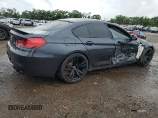 2015 BMW M6 z VIN WBS6C9C59FD467943, wystawiony jako Copart lot #63477904 z przebiegiem 80 186 mil mil oraz Szkody całkowita. Historia ofert i sprzedaży dostępna na DreamBid. Obrazek 3.