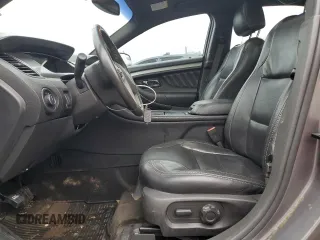 2013 Ford Taurus SEL z VIN 1FAHP2E87DG104349, wystawiony jako Copart lot #57143135 z przebiegiem 129 927 mil mil oraz Szkoda całkowita • Salvage title. Historia ofert i sprzedaży dostępna na DreamBid. Obrazek 7.