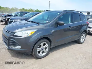 2016 Ford Escape SE with VIN 1FMCU9GX8GUB42944, listed as a IAAI auction lot 42171770 with 120,041 mi miles. Bid and sale history available at carsss.com. Image 2.