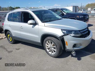 2015 Volkswagen Tiguan SE with VIN WVGAV7AX0FW544218, listed as a IAAI auction lot 41897418 with 97,235 mi miles and . Bid and sale history available at DreamBid. Image 1.