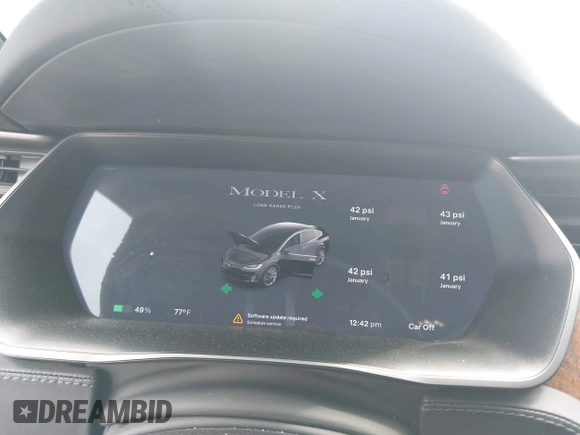 2021 Tesla Model X Long Range Plus with VIN 5YJXCAE27MF324270, listed as a IAAI auction lot 41886101 with 59,614 mi miles and . Bid and sale history available at carsss.com. Image 7.