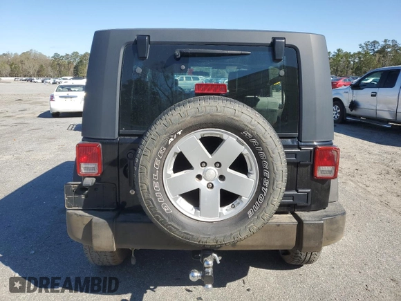 2009 Jeep Wrangler Unlimited X with VIN 1J4GA391X9L788932, listed as a Copart auction lot 49004925 with 105,674 mi miles and Salvage Title. Bid and sale history available at carsss.com. Image 6.