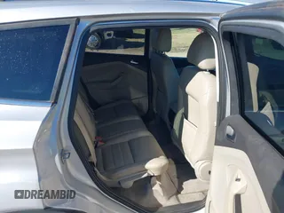 2014 Ford Escape Titanium with VIN 1FMCU0JX7EUC59643, listed as a IAAI auction lot 41082952 with 143,899 mi miles. Bid and sale history available at carsss.com. Image 8.