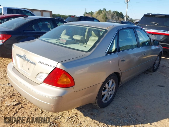 2000 Toyota Avalon XL with VIN 4T1BF28B7YU022621, listed as a IAAI auction lot 41883534 with 200,164 mi miles and . Bid and sale history available at DreamBid. Image 4.