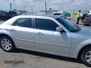 2007 Chrysler 300 Touring with VIN 2C3KA53G57H737815, listed as a IAAI auction lot 42126668 with 46,750 mi miles and . Bid and sale history available at DreamBid. Image 13.