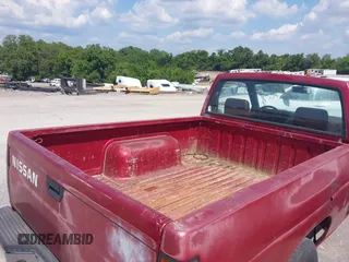 1992 Nissan Frontier with VIN 1N6SD11S3NC330575, listed as a IAAI auction lot 42795852 with 211,635 mi miles and . Bid and sale history available at DreamBid. Image 8.