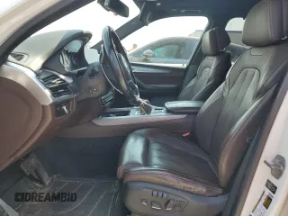 2014 BMW X5 xDrive50i z VIN 5UXKR6C54E0J71803, wystawiony jako Copart lot #60000295 z przebiegiem 130 769 mil mil oraz Czysty tytuł • Clean title. Historia ofert i sprzedaży dostępna na DreamBid. Obrazek 7.