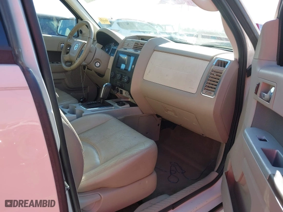 2009 Mercury Mariner Hybrid with VIN 4M2CU29399KJ05674, listed as a IAAI auction lot 40843807 with 194,987 mi miles. Bid and sale history available at carsss.com. Image 5.