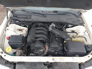 2009 Chrysler 300 LX with VIN 2C3KA43D09H508381, listed as a IAAI auction lot 41834673 with 112,152 mi miles. Bid and sale history available at carsss.com. Image 10.