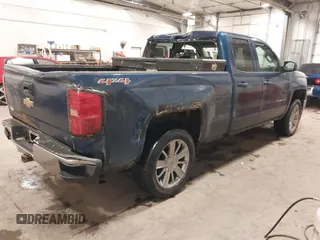 2015 Chevrolet Silverado 1500 LT with VIN 1GCVKREC9FZ424384, listed as a IAAI auction lot 41062960 with 211,461 mi miles and . Bid and sale history available at DreamBid. Image 4.