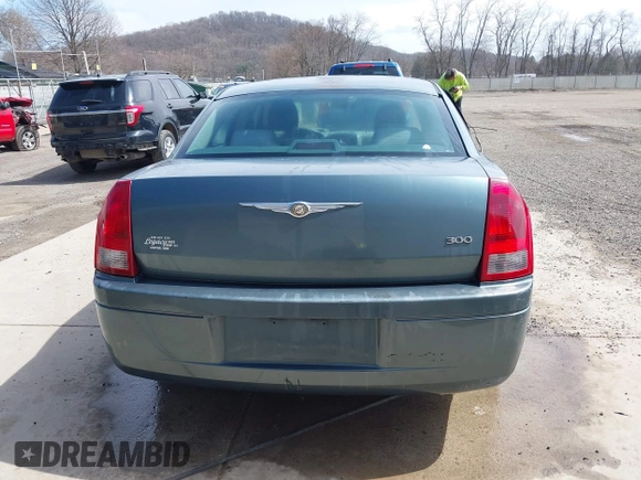 2005 Chrysler 300 with VIN 2C3JA43R45H616682, listed as a IAAI auction lot 41853835 with 158,464 mi miles. Bid and sale history available at carsss.com. Image 16.