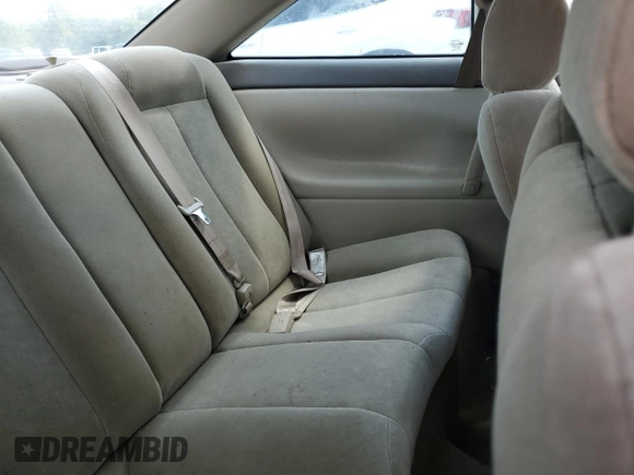 2002 Toyota Solara SE z VIN 2T1CE22P42C005554, wystawiony jako Copart lot #57756005 z przebiegiem 317 340 mil mil oraz Szkoda całkowita • Salvage title. Historia ofert i sprzedaży dostępna na DreamBid. Obrazek 10.