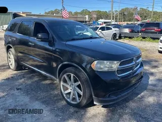 2013 Dodge Durango Crew with VIN 1C4SDHDT1DC697618, listed as a Copart auction lot 88926165 with 128,218 mi miles and Clean Title. Bid and sale history available at carsss.com. Image 1.