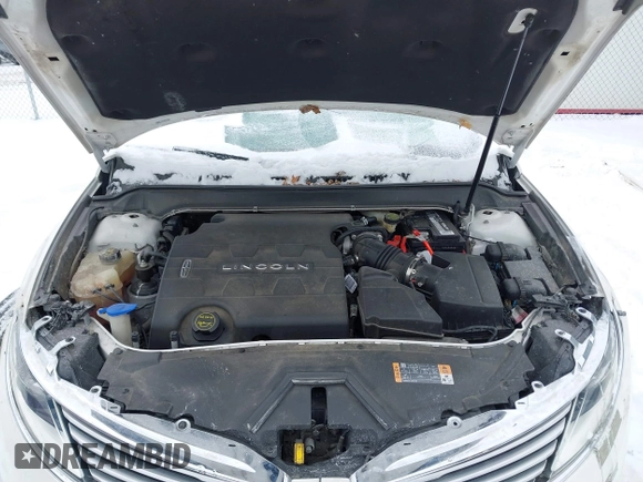 2015 Lincoln MKZ с VIN 3LN6L2JK2FR603436, выставлен на аукционе IAAI как лот 41598218 с пробегом 107 059 миль миль и . История ставок и продаж доступна на DreamBid. Изображение 10.