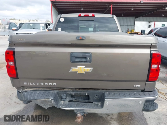 2015 Chevrolet Silverado 1500 LTZ with VIN 3GCPCSEC6FG408754, listed as a IAAI auction lot 41514369 with 140,928 mi miles and . Bid and sale history available at DreamBid. Image 16.