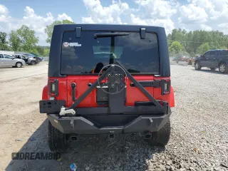 2018 Jeep Wrangler Unlimited Sahara with VIN 1C4BJWEG4JL802145, listed as a Copart auction lot 61931555 with 119,681 mi miles and Salvage title. Bid and sale history available at DreamBid. Image 6.