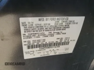 2015 Ford Taurus SE with VIN 1FAHP2D80FG116704, listed as a Copart auction lot 73571034 with 85,665 mi miles and Salvage Title. Bid and sale history available at DreamBid. Image 13.