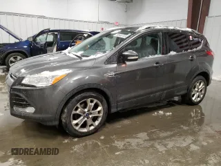 2015 Ford Escape Titanium with VIN 1FMCU9JX0FUA03009, listed as a Copart auction lot 50948755 with 133,748 mi miles and Salvage Title. Bid and sale history available at DreamBid. Image 1.