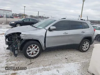 2016 Jeep Cherokee 75th Anniversary with VIN 1C4PJLCB1GW297555, listed as a IAAI auction lot 41232269 with 257,033 mi miles. Bid and sale history available at carsss.com. Image 14.