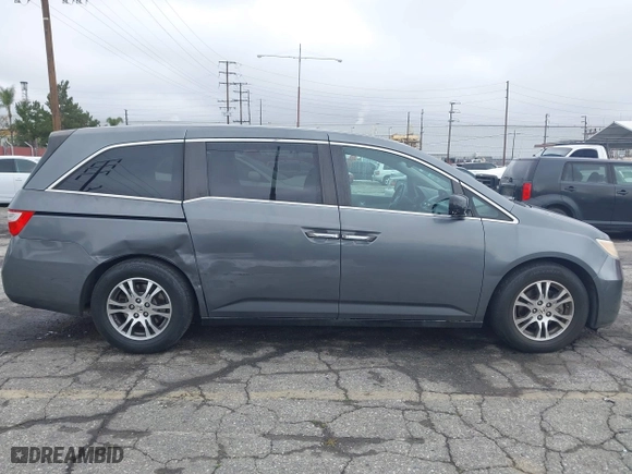 2011 Honda Odyssey EX-L with VIN 5FNRL5H63BB059407, listed as a IAAI auction lot 41922421 with 99,270 mi miles. Bid and sale history available at carsss.com. Image 6.