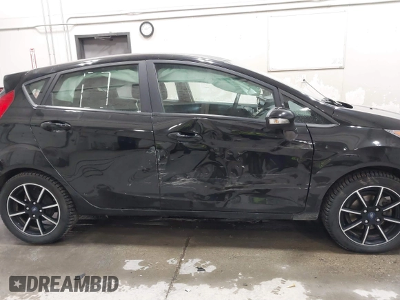 2018 Ford Fiesta SE with VIN 3FADP4EJ4JM139543, listed as a IAAI auction lot 41652653 with 47,517 mi miles and . Bid and sale history available at DreamBid. Image 13.