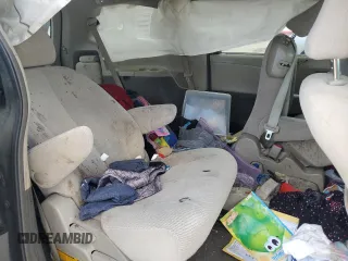 2014 Toyota Sienna LE AAS with VIN 5TDKK3DC5ES423802, listed as a Copart auction lot 69075824 with Not Provided miles and Salvage Title. Bid and sale history available at DreamBid. Image 12.
