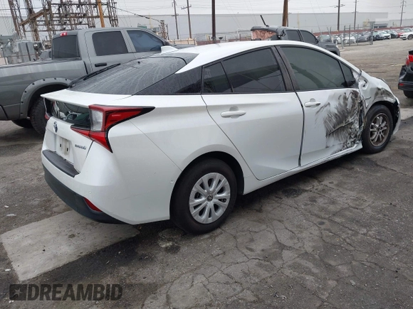 2021 Toyota Prius L Eco with VIN JTDKAMFU6M3150707, listed as a IAAI auction lot 41867272 with 55,499 mi miles and . Bid and sale history available at DreamBid. Image 4.
