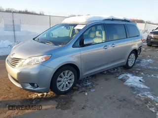 2015 Toyota Sienna Ltd with VIN 5TDDK3DC1FS094834, listed as a IAAI auction lot 41344394 with 137,146 mi miles. Bid and sale history available at carsss.com. Image 2.