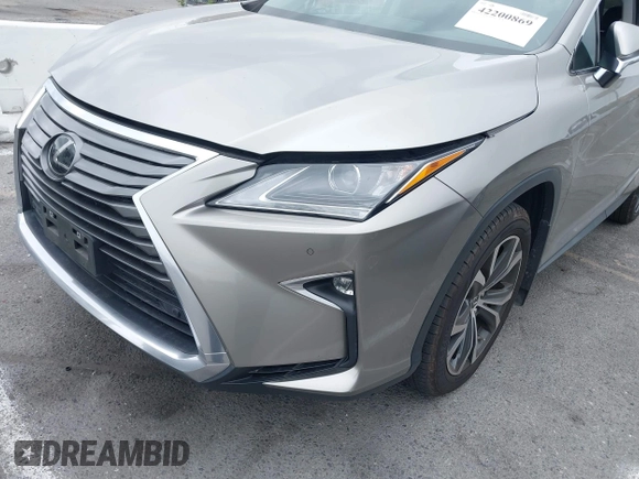 2018 Lexus RX 350 with VIN 2T2ZZMCA2JC098105, listed as a IAAI auction lot 42200869 with 52,323 mi miles and . Bid and sale history available at DreamBid. Image 6.