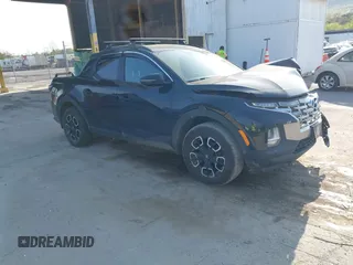 2022 Hyundai Santa Cruz SEL z VIN 5NTJCDAE8NH036964, wystawiony jako IAAI lot #42137256 z przebiegiem 56 636 mil mil oraz . Historia ofert i sprzedaży dostępna na DreamBid. Obrazek 1.