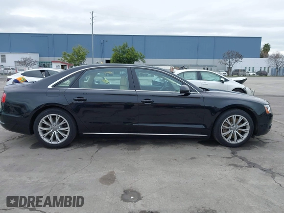 2012 Audi A8 L with VIN WAURVAFD7CN005452, listed as a IAAI auction lot 41529084 with 80,738 mi miles. Bid and sale history available at carsss.com. Image 13.
