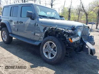 2022 Jeep Wrangler Unlimited Sahara with VIN 1C4HJXEM7NW206585, listed as a IAAI auction lot 42102516 with 10,769 mi miles and . Bid and sale history available at DreamBid. Image 1.