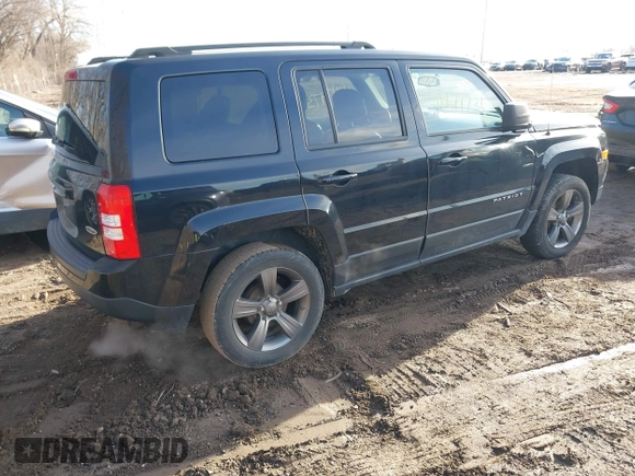 2014 Jeep Patriot High Altitude with VIN 1C4NJPFAXED888929, listed as a IAAI auction lot 41474736 with 117,697 mi miles and . Bid and sale history available at carsss.com. Image 4.