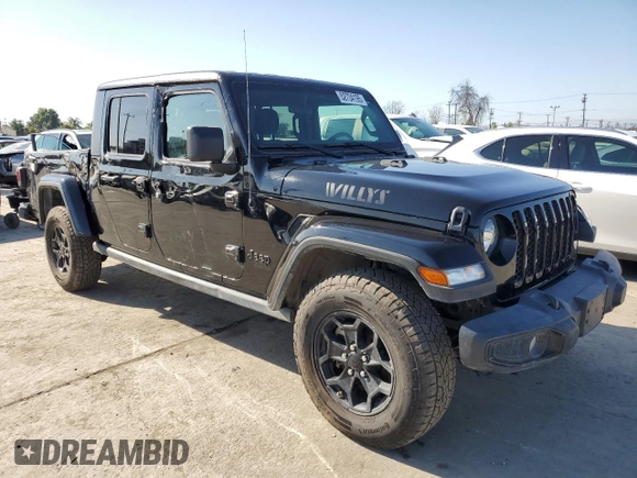 2021 Jeep Gladiator Willys with VIN 1C6HJTAG8ML563161, listed as a Copart auction lot 52734195 with 48,521 mi miles and Salvage title. Bid and sale history available at DreamBid. Image 4.