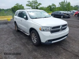 2013 Dodge Durango Crew with VIN 1C4RDJDG9DC667338, listed as a IAAI auction lot 42639559 with 137,020 mi miles and . Bid and sale history available at DreamBid. Image 1.