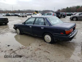 1989 Toyota Camry z VIN JT2SV21E6K3335385, wystawiony jako Copart lot #82466934 z przebiegiem 74 815 mil mil oraz Czysty tytuł • Clean title. Historia ofert i sprzedaży dostępna na DreamBid. Obrazek 2.