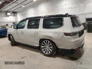 2022 Jeep Grand Wagoneer Series I with VIN 1C4SJVEJ2NS180968, listed as a Copart auction lot 61053895 with 14,741 mi miles and Salvage title. Bid and sale history available at DreamBid. Image 2.