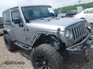 2016 Jeep Wrangler Black Bear with VIN 1C4AJWAG5GL258426, listed as a IAAI auction lot 42400914 with 128,606 mi miles and . Bid and sale history available at DreamBid. Image 6.