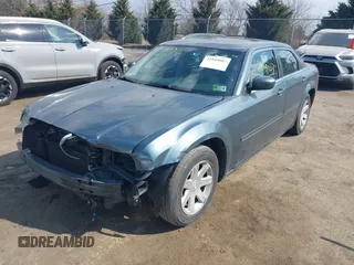 2005 Chrysler 300 with VIN 2C3JA53G35H157178, listed as a IAAI auction lot 41849007 with 149,247 mi miles. Bid and sale history available at carsss.com. Image 16.