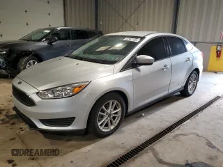 2018 Ford Focus SE z VIN 1FADP3F29JL309706, wystawiony jako Copart lot #64563195 z przebiegiem 41 755 mil mil oraz Szkoda całkowita • Salvage title. Historia ofert i sprzedaży dostępna na DreamBid. Obrazek 1.