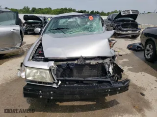2003 Mercury Grand Marquis GS Convenience with VIN 2MEFM74W13X671414, listed as a Copart auction lot 63143394 with 129,629 mi miles and Non Repairable. Bid and sale history available at carsss.com. Image 5.