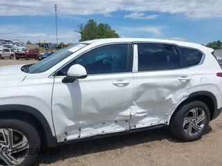 2023 Hyundai Santa Fe SE with VIN 5NMS14AJ9PH630176, listed as a IAAI auction lot 42202536 with 26,624 mi miles and . Bid and sale history available at DreamBid. Image 6.