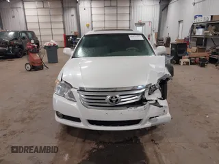 2010 Toyota Avalon XL with VIN 4T1BK3DB9AU358803, listed as a IAAI auction lot 41072257 with 157,185 mi miles and . Bid and sale history available at DreamBid. Image 12.