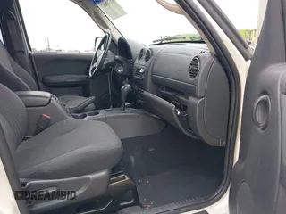 2002 Jeep Liberty Sport with VIN 1J4GL48K92W268896, listed as a IAAI auction lot 41788687 with 102,706 mi miles. Bid and sale history available at carsss.com. Image 5.