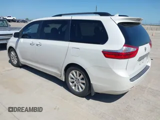 2015 Toyota Sienna XLE with VIN 5TDYK3DC8FS666113, listed as a IAAI auction lot 41999037 with 179,566 mi miles and . Bid and sale history available at carsss.com. Image 3.