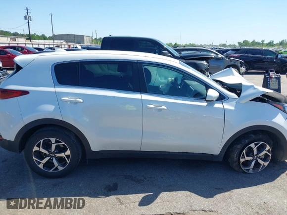 2021 Kia Sportage LX with VIN KNDPM3AC8M7932425, listed as a IAAI auction lot 39067549 with 56,841 mi miles. Bid and sale history available at carsss.com. Image 12.