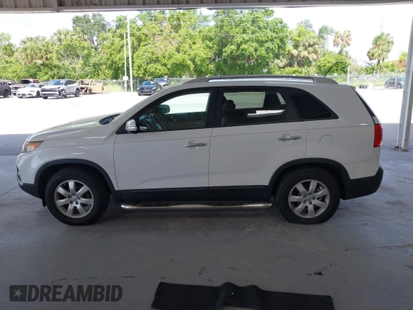 2013 Kia Sorento LX with VIN 5XYKT3A69DG370190, listed as a IAAI auction lot 42456161 with 170,196 mi miles and . Bid and sale history available at DreamBid. Image 14.