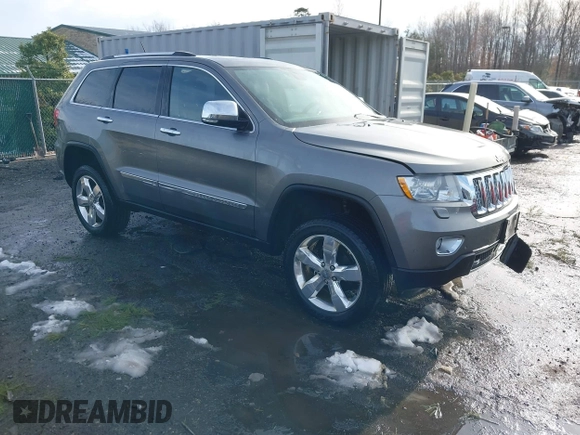 2013 Jeep Grand Cherokee Overland with VIN 1C4RJFCG8DC581719, listed as a IAAI auction lot 41566666 with 152,332 mi miles. Bid and sale history available at carsss.com. Image 1.
