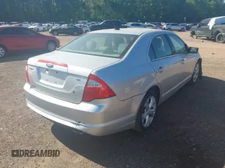 2012 Ford Fusion SE with VIN 3FAHP0HAXCR226407, listed as a IAAI auction lot 41982689 with 193,432 mi miles. Bid and sale history available at carsss.com. Image 4.