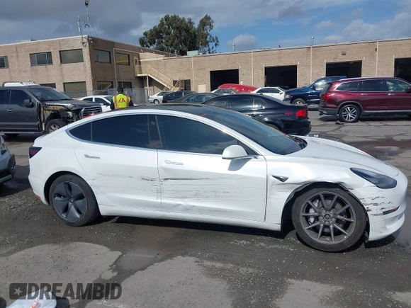 2020 Tesla Model 3 Long Range with VIN 5YJ3E1EB6LF619528, listed as a IAAI auction lot 41937430 with 70,327 mi miles. Bid and sale history available at carsss.com. Image 14.